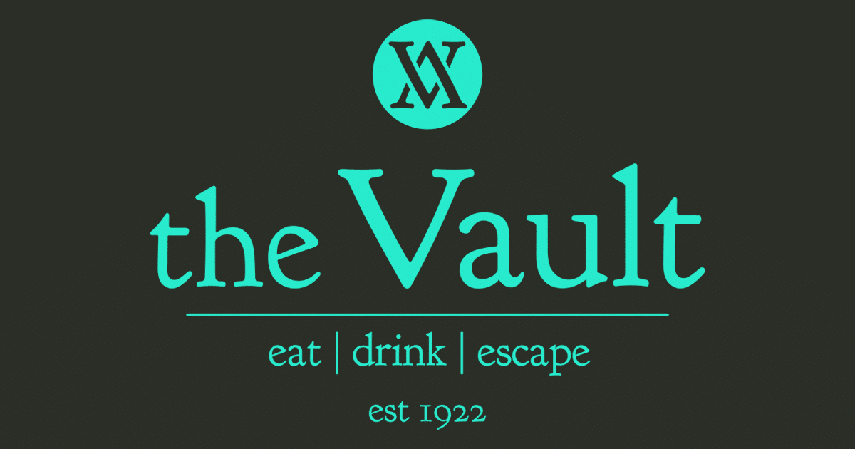 The Vault full logo teal on black.